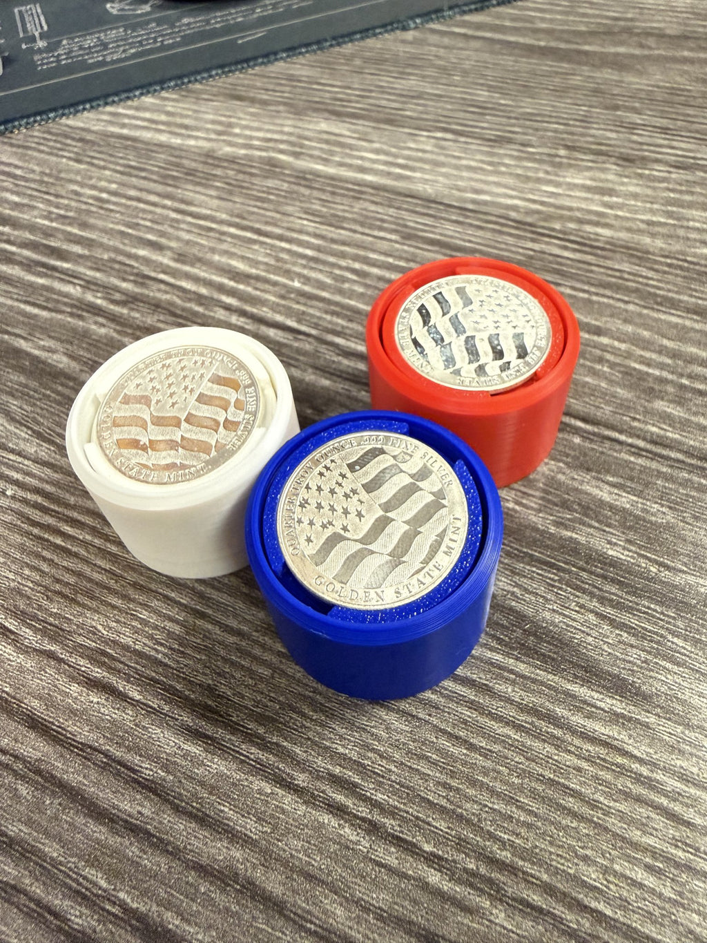Silver Coin Fidget Clickers showing the quarter troy ounce .999 fine silver Golden State Mint round